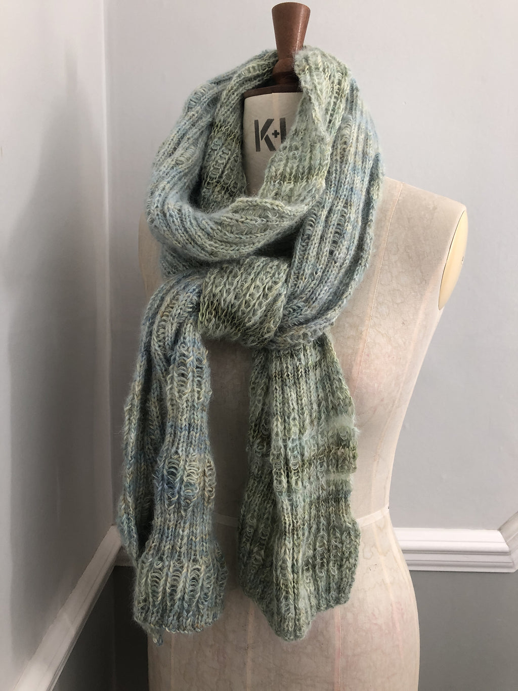 Soft hand-dyed wool and baby silk alpaca in soft tones of greens and soft blues