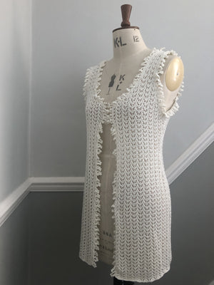 Lace-knit sleeveless cardigan